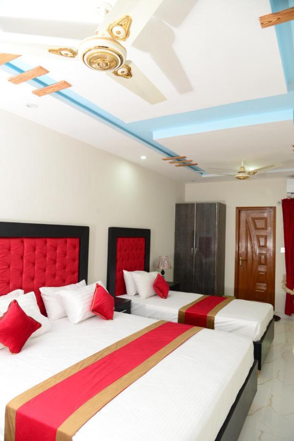 Hotel Deluxe Lahore Bagian luar foto